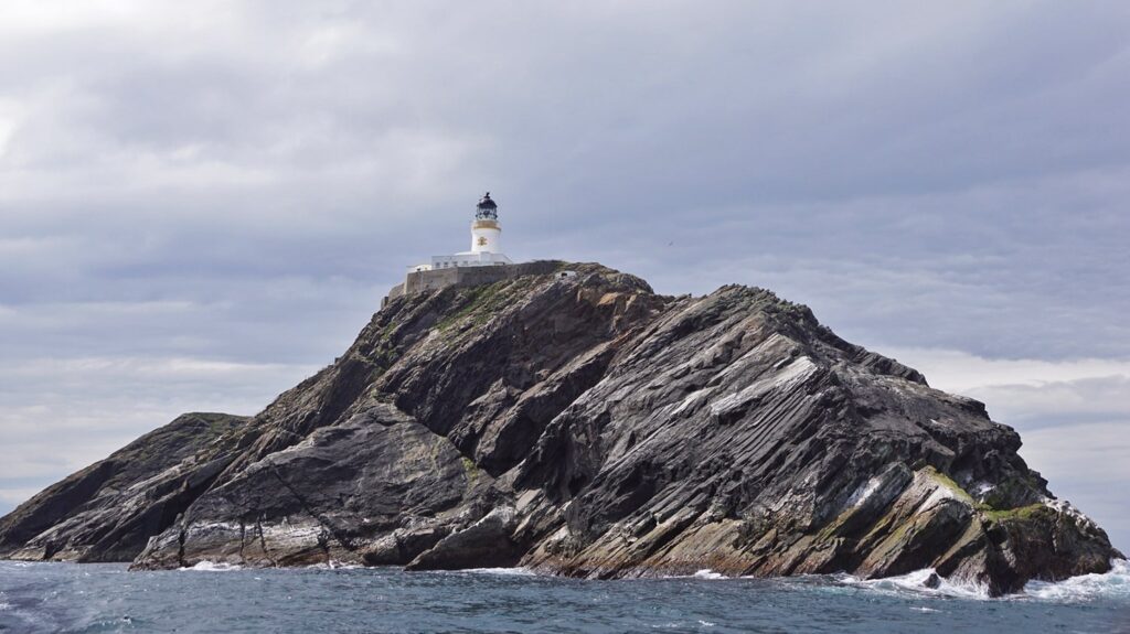 Muckle Flugga Lighthouse sits on a small, jagged isle