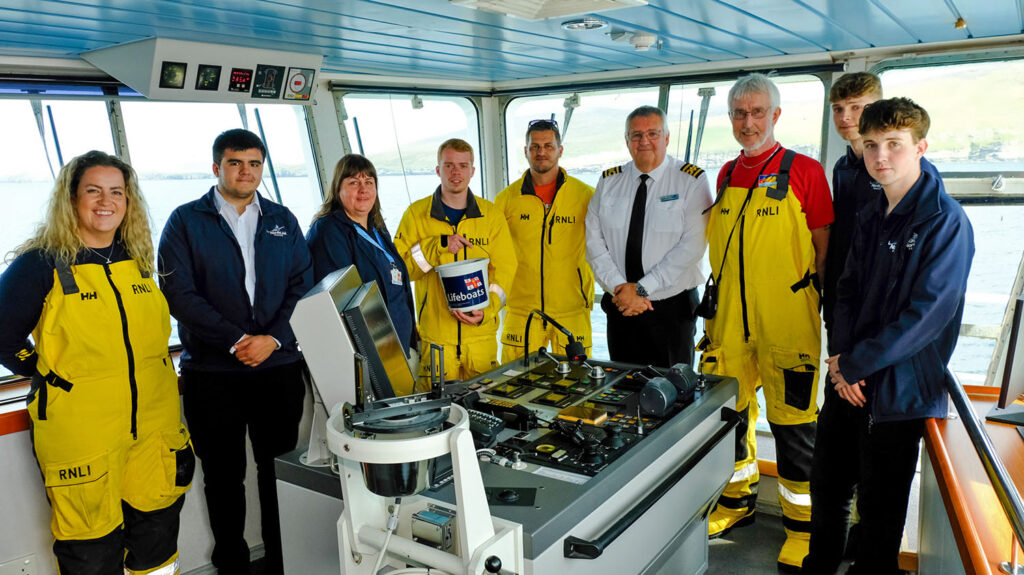 NorthLink staff with members of the RNLI on the Round Bressay cruise