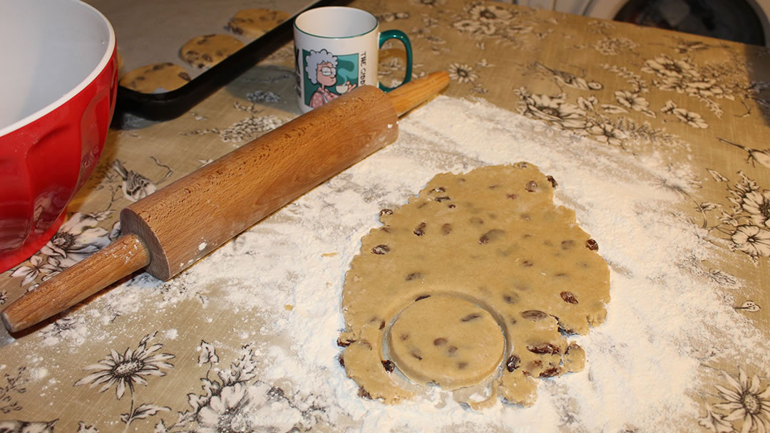 Rolling out the dough and cutting the biscuits