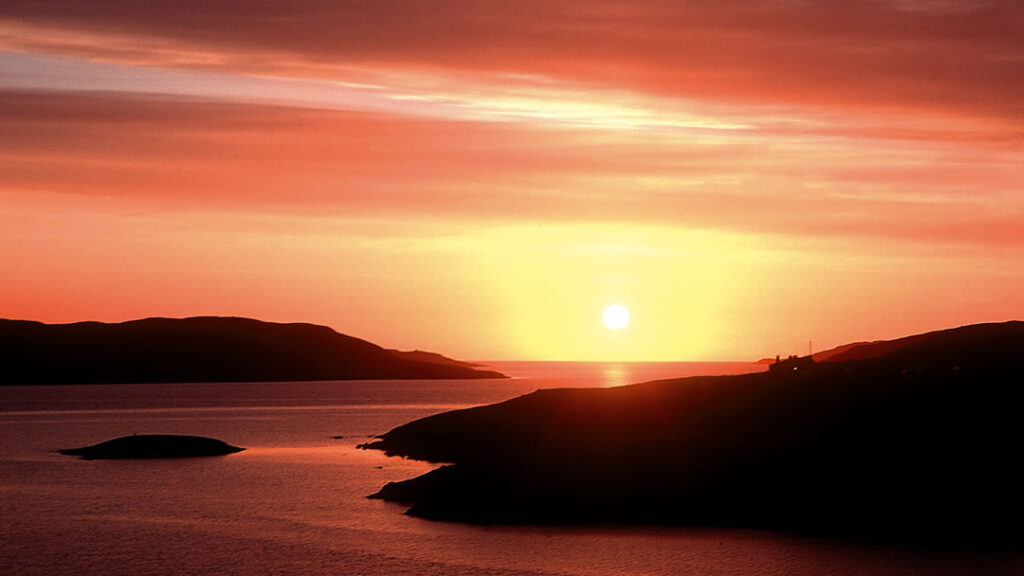 Sunset over Aith voe in Shetland