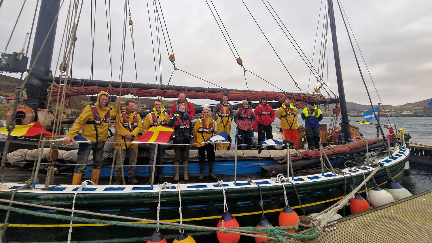 Swan Returns Home with New Mast