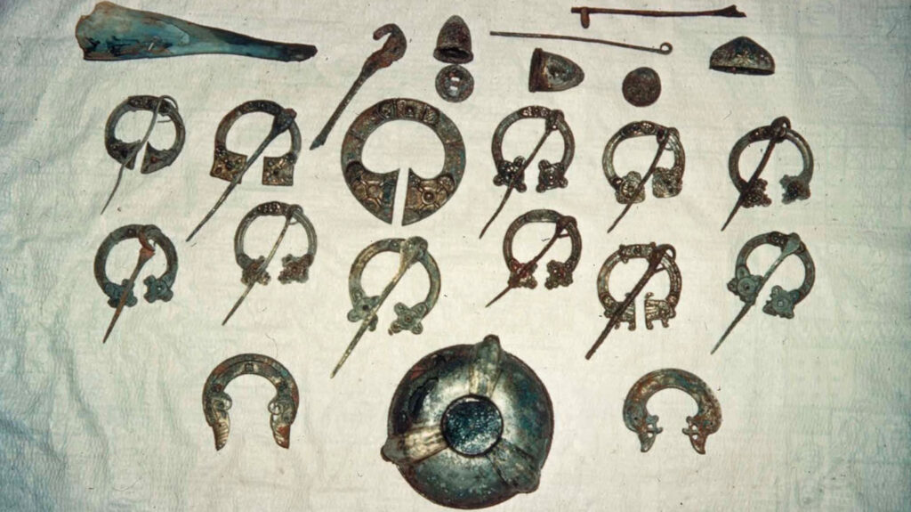 St. Ninian's Isle excavations and the treasure spread out on the Bigton House table