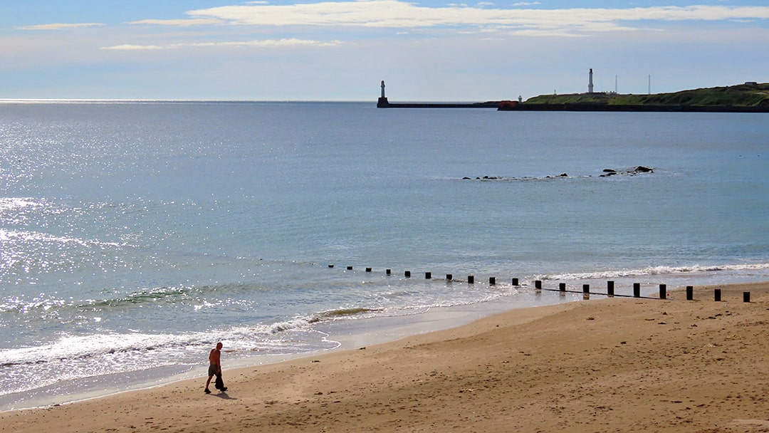 Walking along Aberdeen beach